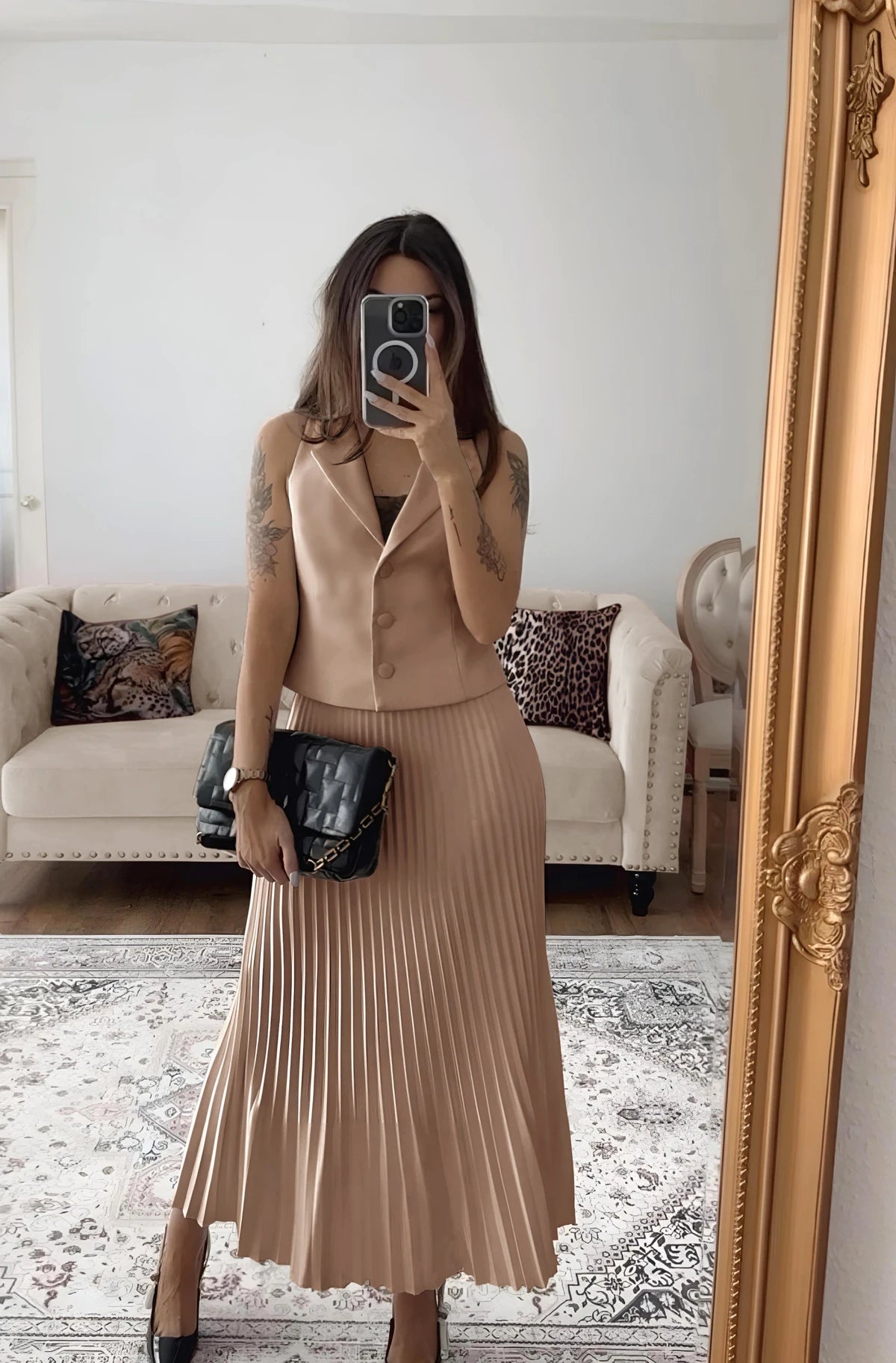 Chique Mouwloos Gilet met Lange Plooirok